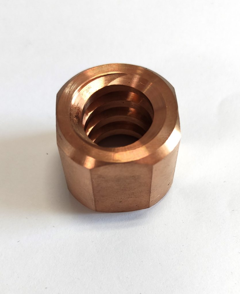 35.1052-6MM BRONZE NUT LH REV0 6.0 MM PITCH